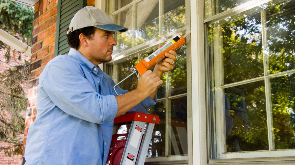 Midland homeowner performing spring maintenance on his home